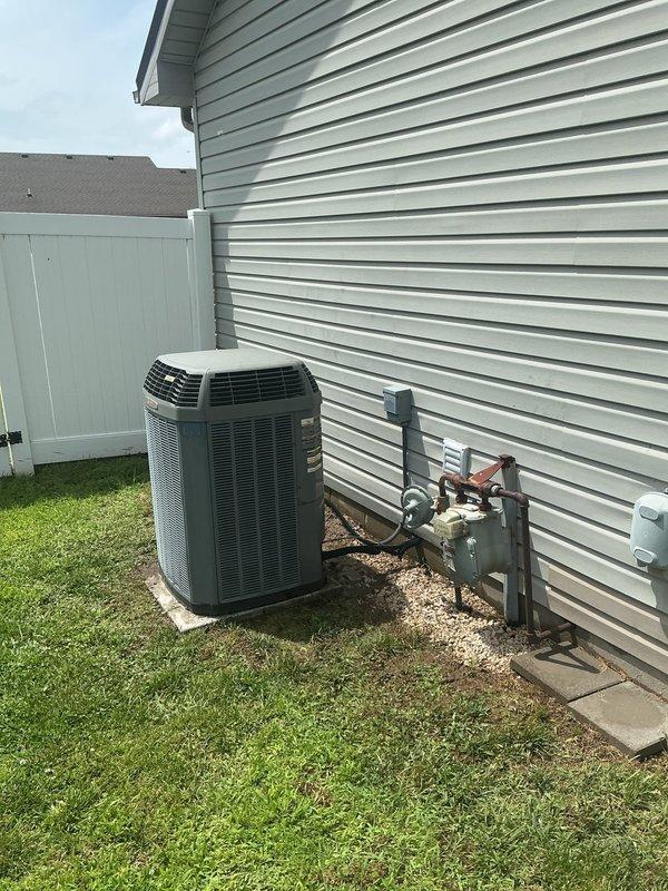 # HVAC Service Report

Responded to no-cooling complaint where outdoor condenser fan was not operating despite unit appearing to run. Diagnosed failed condenser fan motor on residential split system air conditioning unit. Replaced defective fan motor with OEM equivalent component, verified proper rotation and amperage draw. Tested system operation through complete cooling cycle, confirmed adequate airflow across condenser coil and normal refrigerant pressures. System restored to full cooling capacity with all safety controls functioning properly.