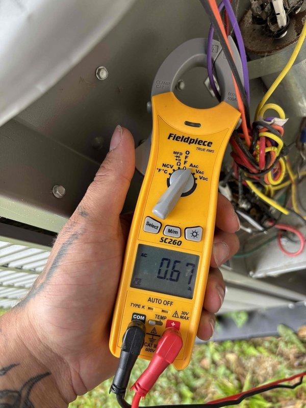 Completed scheduled AC tune-up and preventative maintenance on residential air conditioning system. Performed comprehensive electrical diagnostics using Fieldpiece SC260 meter to verify proper voltage, amperage, and system performance at the air handler unit. Inspected and documented all electrical connections, terminal blocks, and wiring configurations within the equipment to ensure safe operation and compliance with manufacturer specifications.