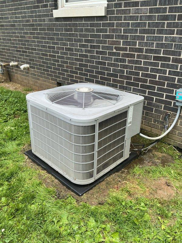 Completed monthly planned maintenance on 11-year-old residential HVAC system. Inspected outdoor condenser unit, which showed normal wear consistent with age including minor dirt accumulation on coil fins and slight weathering of exterior casing. Cleared yard debris and grass clippings from around unit base to ensure proper airflow. Replaced 16x25x4 polarized air filter per maintenance schedule. Verified refrigerant lines and connections showed no visible signs of damage or leakage. Unit operational and functioning within normal parameters upon completion of service.