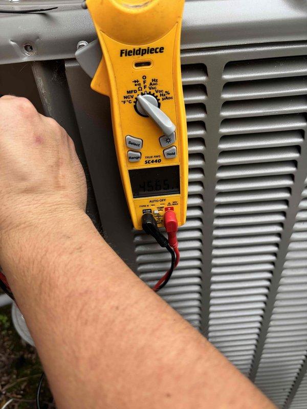 Performed comprehensive preventive maintenance on a two-year-old air conditioning system with no reported operational concerns. Conducted complete system inspection including temperature differential measurements across the evaporator coil, verified refrigerant pressures and electrical parameters using calibrated digital multimeter at the outdoor condensing unit, and inspected condenser coil fins for proper airflow. All components operating within manufacturer specifications with no deficiencies noted.