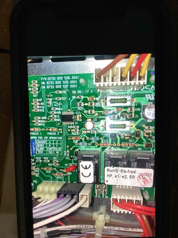 Responded to service callback for HVAC system in basement with fan not running and temperature rising above setpoint. Upon inspection, diagnosed failed blower motor and potentially faulty control board based on system behavior and visual examination. Documented control board part numbers (P/N: 8739 909 536.0001) and photographed PCB showing multiple wire connections, RoHS-compliant components, and board configuration for parts ordering. Estimated 120 minutes repair time once replacement blower motor and control board are received.