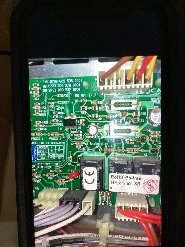 Responded to service callback for HVAC system in basement with fan not running and temperature rising above setpoint. Upon inspection, diagnosed failed blower motor and potentially faulty control board based on system behavior and visual examination. Documented control board part numbers (P/N: 8739 909 536.0001) and photographed PCB showing multiple wire connections, RoHS-compliant components, and board configuration for parts ordering. Estimated 120 minutes repair time once replacement blower motor and control board are received.