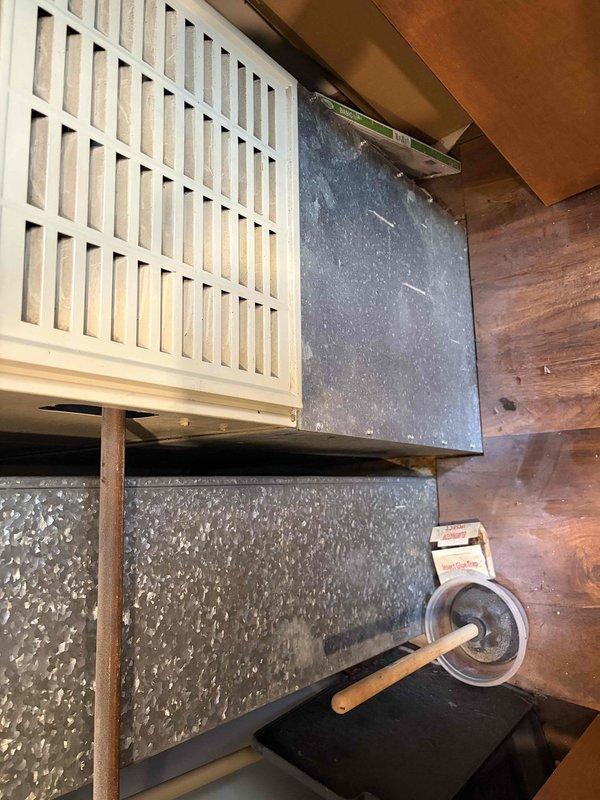 Responded to no cooling complaint on older Carrier air conditioning system serving approximately 973 square foot cabin-style home with cathedral ceilings. Upon arrival, confirmed outdoor unit fan motor operating but compressor not running, resulting in no cold air production. Diagnosed failed compressor and/or capacitor on aging outdoor condensing unit. Reviewed system age and repair costs with homeowner, discussed options for repair versus replacement given unit's advanced age and declining efficiency. Customer opted to consider replacement options due to cost-effectiveness compared to major component repair on older equipment.