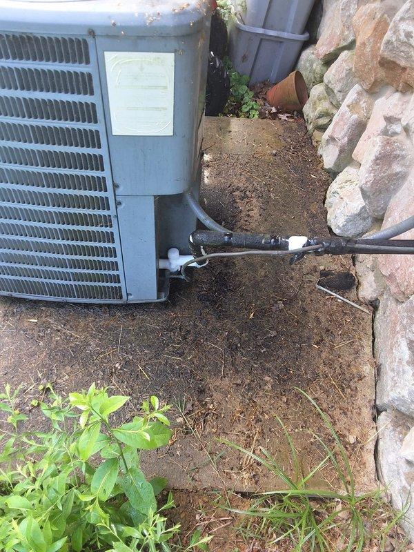 Responded to service call for air conditioning system not cooling with visible ice and frost accumulation on both outdoor unit and indoor furnace area. Upon arrival, performed comprehensive system evaluation and documented existing equipment installation. Conducted load calculation analysis revealing cooling load of 35,220 BTU and heating load of 55,053 BTU for the residence. Assessment identified freezing condition affecting system performance, with ice buildup preventing proper refrigerant flow and heat exchange. Documented outdoor condensing unit installation and current system configuration for service records and future reference.