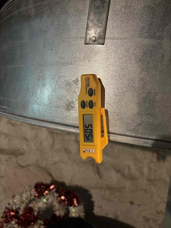 Responded to no cooling complaint on 1-year-old system where outdoor unit was running but indoor blower was not operating, resulting in no airflow through vents. Performed diagnostic testing and measured system pressures using digital manifold gauges, confirming R410A refrigerant levels with suction pressure at 102.8 psi (32.7°F) and discharge pressure at 285.1 psi (92.5°F). Diagnosed indoor blower motor failure preventing air handler operation. System restored to proper cooling operation with adequate airflow confirmed at supply registers.