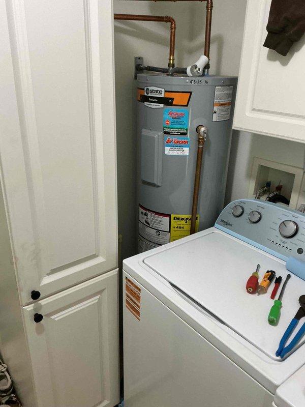 Completed scheduled tanked water heater flush on State brand unit as part of preventive maintenance plan. Coordinated arrival time with tenant, performed standard flush procedure to remove sediment buildup from tank bottom, inspected copper supply lines and pressure relief valve discharge tube for proper operation, and verified all connections remained secure. Unit operating efficiently with no leaks detected upon completion.