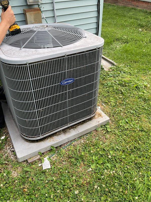 Provided free second opinion on Carrier condensing unit with reported thermostat wiring issue to outdoor unit. Inspected exterior condenser unit and traced low-voltage control wiring from thermostat through crawl space to equipment. Evaluated wire condition, connections, and continuity to verify previous diagnosis regarding wire repair needs between thermostat and condenser.