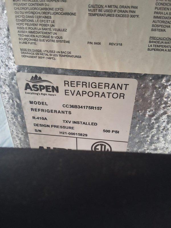 Responded to no cooling complaint on R-410A system with Aspen evaporator coil model CC36B34175R157. Diagnosed failed evaporator coil requiring replacement. Verified system specifications, documented refrigerant type and model information, and ordered replacement evaporator coil with estimated half-day installation time required.