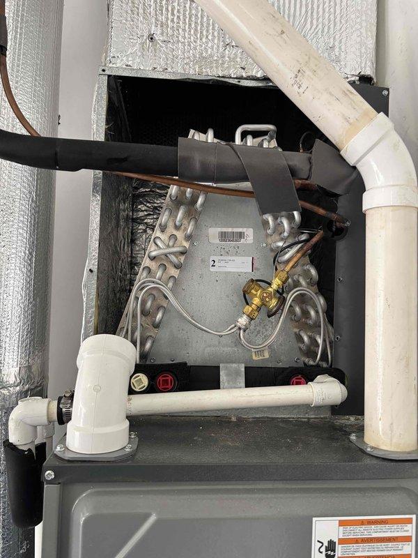 Completed planned HVAC maintenance tune-up as part of membership service. Performed comprehensive system inspection of furnace unit, verified all components operating within normal parameters, and documented ambient temperature reading of 77.2°F at equipment location.