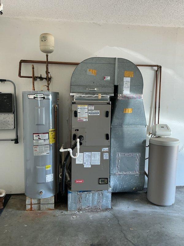Completed first annual Gold Level maintenance visit on single HVAC system with Bryant furnace installation. Performed comprehensive inspection of furnace unit, ductwork, and associated mechanical components in garage utility space. Documented system configuration including foil-wrapped ductwork with proper insulation, verified electrical connections, and confirmed all mechanical equipment operational per manufacturer specifications.