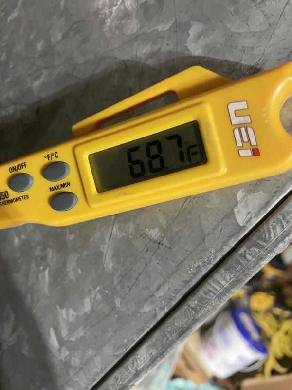 Performed follow-up site visit to address ongoing humidity concerns and A/C performance issues. Conducted temperature measurements at multiple locations, documenting ambient conditions reading 68.7°F. Customer reports system is not adequately controlling indoor humidity levels as it had previously, indicating potential issues with cooling capacity, airflow, or dehumidification performance that will require further diagnostic evaluation of the condensing unit, evaporator coil, and refrigerant charge.