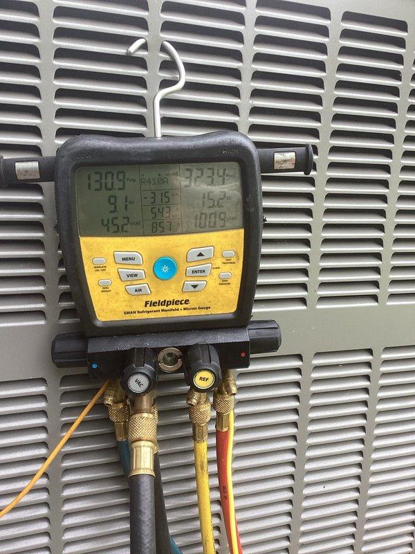 Responded to no cooling complaint on 3-year-old system blowing room temperature air. Connected refrigerant manifold gauges to service ports and performed system diagnostics. Measured suction and discharge pressures along with temperature readings at evaporator coil. Inspected condenser coil fins, refrigerant lines, and copper piping connections for proper operation. System showed adequate airflow through vents with no ice buildup present. Evaluated heat exchanger assembly and verified refrigerant line insulation integrity. Documented pressure and temperature differentials across the system to determine root cause of cooling loss and provided recommendations for necessary repairs to restore proper cooling function.