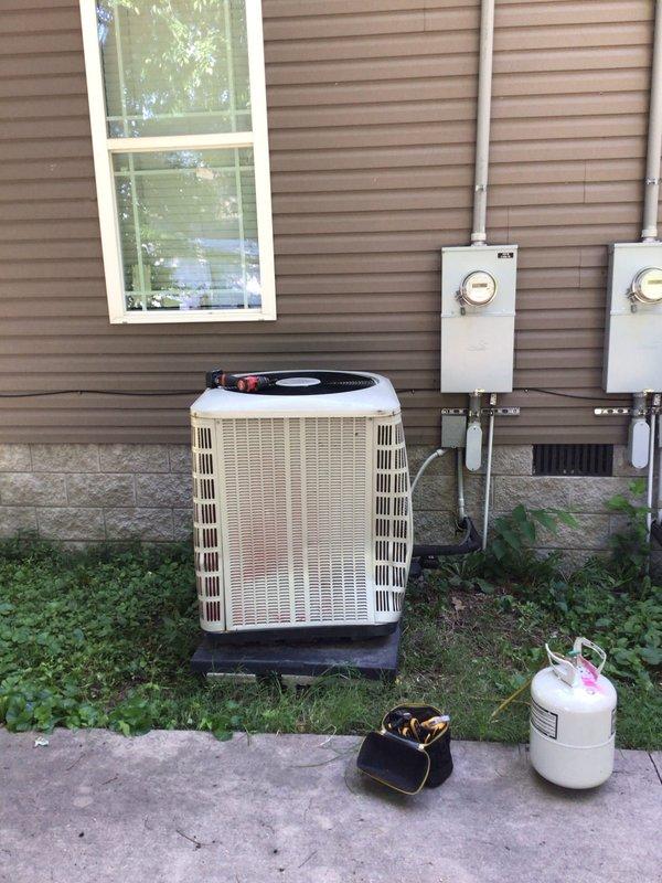 Responded to no cooling complaint on 5-year-old residential air conditioning system blowing room temperature air with 8-degree temperature differential between setpoint and actual room temperature. Upon arrival, confirmed adequate airflow at supply registers with no ice formation on evaporator coil or refrigerant lines. Performed comprehensive system diagnostics on outdoor condenser unit and associated components. Inspected condenser coil for debris and airflow obstruction, verified proper electrical connections at disconnect panel, and evaluated refrigerant line set connections at condensing unit. System evaluated for proper refrigerant charge, compressor operation, and capacitor function to identify root cause of loss of cooling capacity and restore proper system operation.