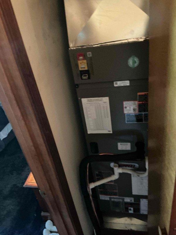 Completed installation of a 2-ton, 16 SEER heat pump system with matching air handler unit. The air handler was mounted vertically in an interior utility closet with proper clearances maintained for service access. Connected flexible supply ductwork to the unit's discharge plenum and routed through the attic space, securing all connections with appropriate metallic tape and ensuring proper support throughout the duct run. Installed PVC condensate drain line from the air handler with proper pitch for drainage. Verified all manufacturer labels, warranty documentation, and technical specification stickers were properly affixed to the equipment. System was tested and confirmed operational upon completion.