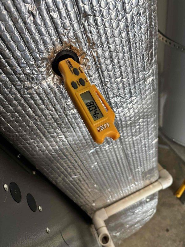 Completed scheduled HVAC maintenance tune-up on residential system. Performed comprehensive system diagnostics including temperature differential measurements across insulated ductwork, recording supply air temperature of 88.4°F. Inspected bubble-foil insulation integrity on duct components and verified proper thermal protection. All system parameters checked and found operating within normal specifications.