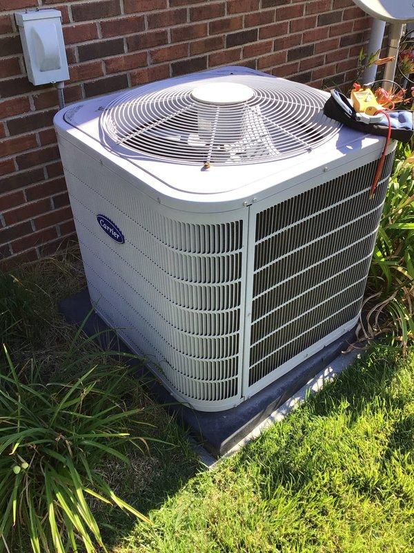 Completed scheduled HVAC maintenance tune-up on residential Carrier air conditioning unit. Performed comprehensive system inspection of outdoor condenser unit, verified proper operation of all components, and documented equipment condition through photographic records. All systems operating within normal parameters upon completion of service.