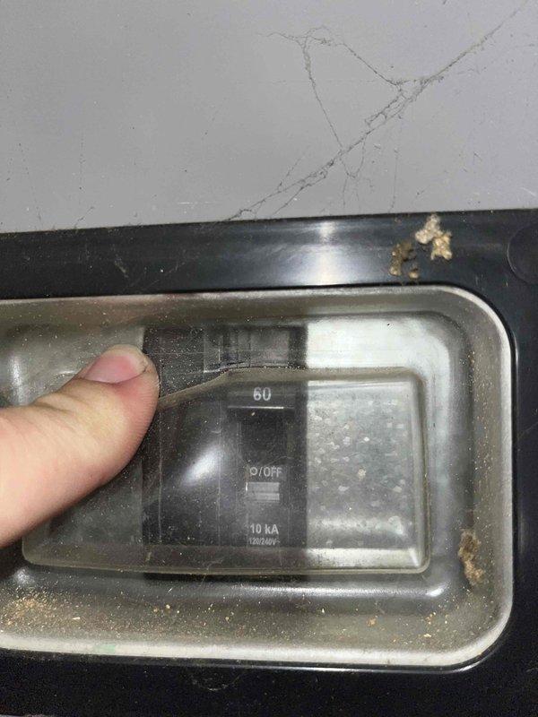 Conducted comprehensive replacement estimate for residential HVAC system with completely failed air handler unit. Evaluated existing gray metal cabinet-style air handler installed in utility closet, documented refrigerant lines, copper piping, electrical disconnect switch rated at 60A/10kA, and return air grille configuration. Assessed confined installation space clearances, photographed current equipment specifications including manufacturer labels and safety warnings, examined electrical connections showing signs of age and accumulated debris, and provided complete system replacement recommendations due to non-functional equipment requiring full replacement rather than repair options.