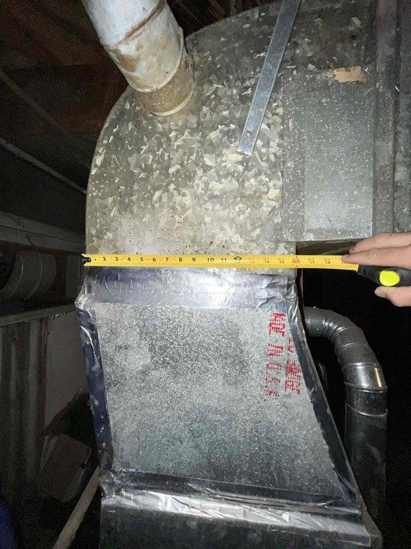 Conducted comprehensive HVAC replacement estimate for non-operational system. Documented existing equipment including 100-amp electrical panel with circuit breakers and air handler unit located in attic space. Observed significant mold contamination throughout ductwork and air handler components, with thick microbial growth covering metal surfaces and requiring remediation prior to new equipment installation. Measured existing ductwork dimensions and assessed electrical infrastructure to determine compatibility requirements for replacement system.