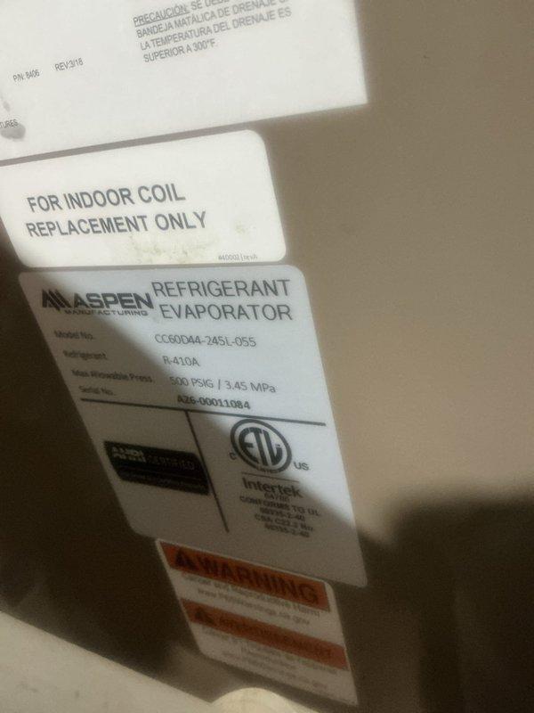 Responded to no cooling complaint on residential HVAC system located in basement. Upon inspection, diagnosed failed evaporator coil and thermal expansion valve (TXV) on Aspen refrigerant evaporator unit, model CC6004A-2ASL-05S utilizing R-410A refrigerant. Parts have been ordered for follow-up replacement requiring approximately half-day installation time, with system currently in non-operational status until repair completion.