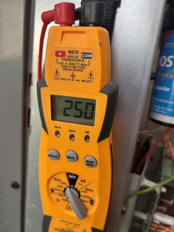 Completed Platinum Level annual maintenance on 3-year-old HVAC system. Performed comprehensive system diagnostics using digital multimeter to verify electrical parameters and capacitor functionality, with readings confirming proper voltage levels at 250V. Replaced 30x30x1 air filter and conducted full system inspection per maintenance protocol.