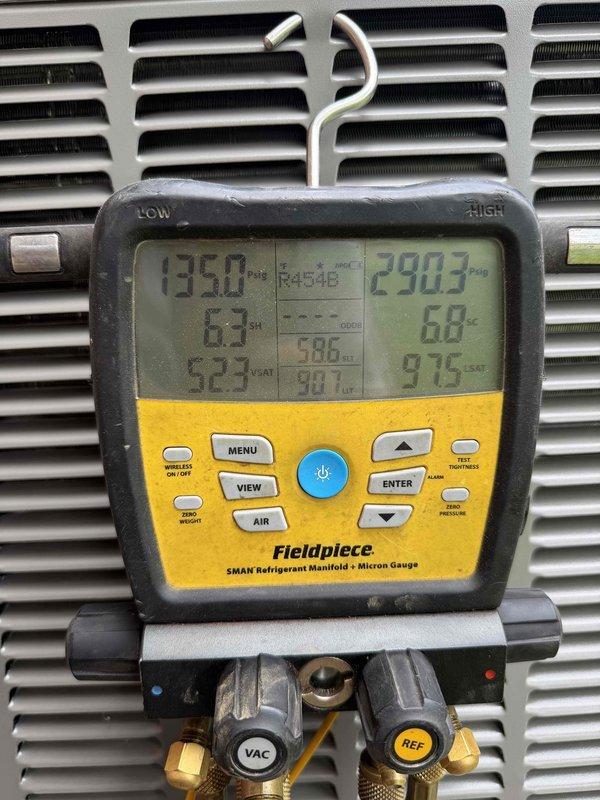 Completed installation of a 2.5-ton, 15.2 SEER heat pump system with matching air handler in residential basement location. Performed system commissioning including refrigerant charge verification, pressure testing, and operational diagnostics using calibrated manifold gauges to ensure proper system performance and efficiency.