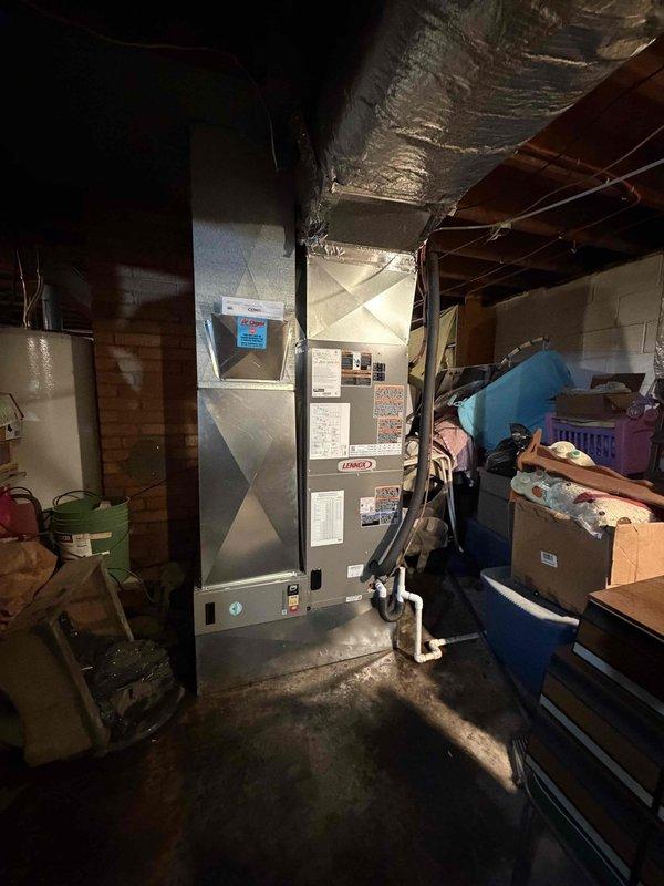 Completed installation of a 2.5-ton, 15.2 SEER heat pump system with matching air handler in residential basement location. Performed system commissioning including refrigerant charge verification, pressure testing, and operational diagnostics using calibrated manifold gauges to ensure proper system performance and efficiency.