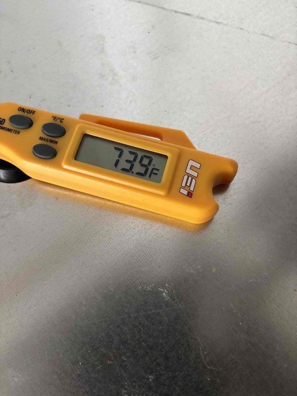 Completed Gold Level planned maintenance on single HVAC system. Performed comprehensive system inspection, verified temperature readings at 73.9°F, accessed outdoor unit to inspect electrical connections, capacitor, and control board functionality. Documented system condition with photos showing internal components including wiring harness, capacitor, and control module all operating within normal parameters.