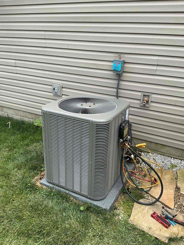 Completed installation of 3-ton air conditioning system with matching evaporator coil. Unit was properly positioned on concrete pad, refrigerant lines connected and tested, condensate drainage configured with PVC piping, and electrical connections established including disconnect and service panel integration. System was charged, tested with manifold gauges, and verified operational.