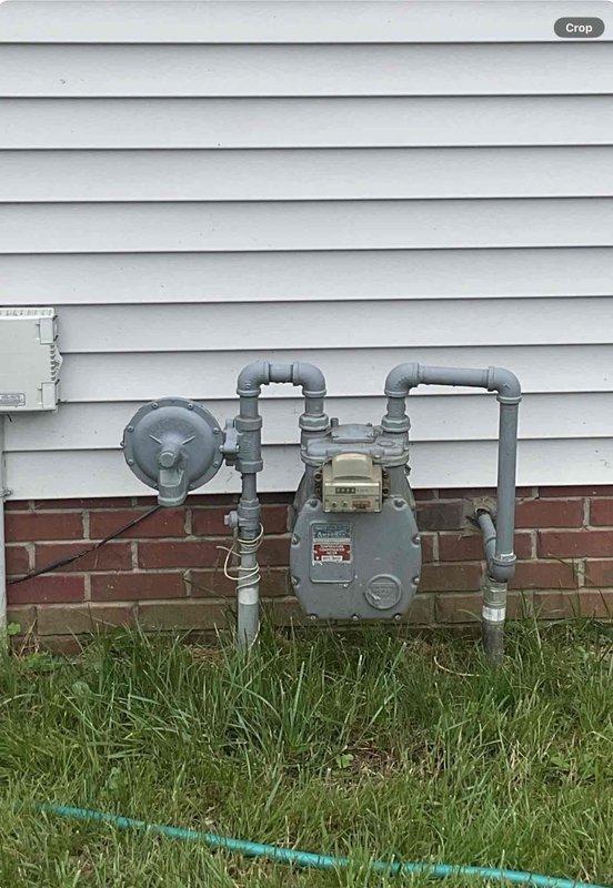 Conducted comprehensive replacement estimate for residential HVAC system. Evaluated existing package unit configuration and assessed crawlspace ductwork for complete system replacement. Documented electrical panel capacity with dual-column breaker configuration and verified natural gas meter assembly with pressure regulator for equipment compatibility and proper utility connections.