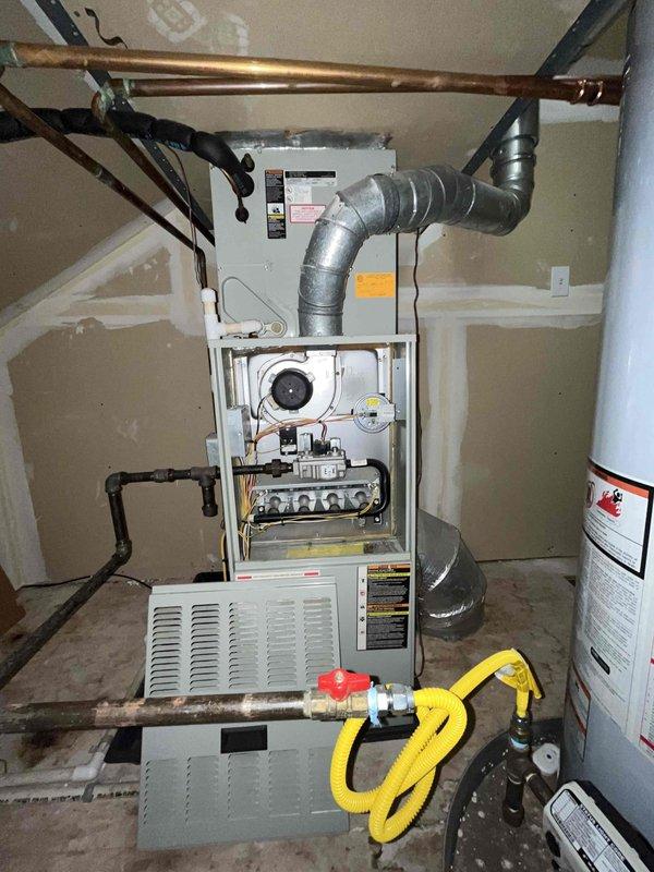 Conducted comprehensive HVAC replacement estimate for 25-year-old heating and cooling system currently in operational condition. Assessed existing gas furnace with exposed internal components including blower motor, gas valves, and burner assembly, along with associated ductwork and electrical panel configuration. Documented equipment condition, reviewed system specifications, and provided recommendations for complete system replacement to improve efficiency and reliability.