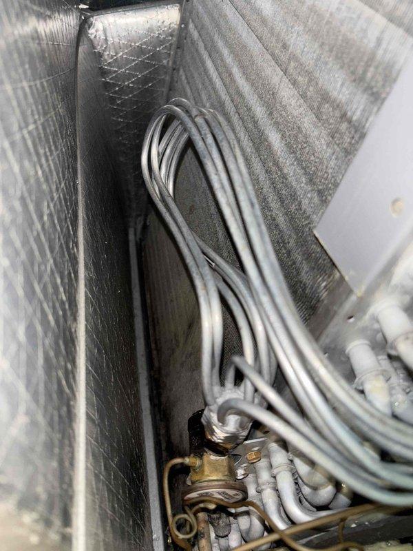 # HVAC Maintenance Summary

Completed first annual Platinum Level maintenance on a 7-month-old single HVAC system. Performed comprehensive inspection of air handling unit components, including refrigerant lines, flexible ductwork, and mechanical connections. Replaced 20x20x1 air filter and verified proper system operation. Documented temperature readings at 83.1°F using calibrated digital thermometer to confirm normal operating parameters. All internal components, including brass fittings, conduit routing, and insulated ductwork, inspected and found in good working condition with no issues identified.