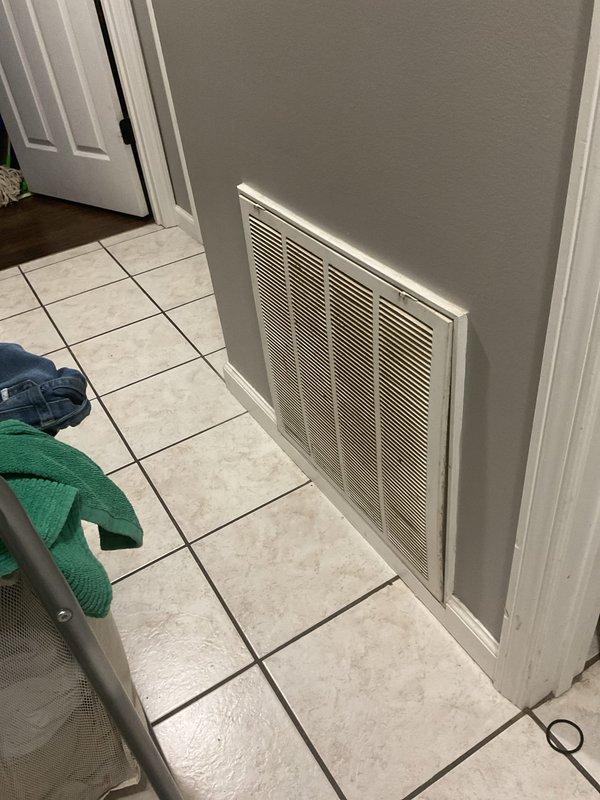 Conducted on-site consultation and assessment for complete air conditioning system replacement. Evaluated existing 19-year-old AC unit and documented current system configuration, including interior return air vent location and existing thermostat control system with exposed wiring and circuit board components. Provided homeowner with equipment options and financing information for new system installation.