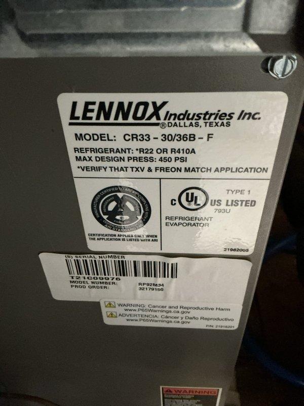 Completed dismissed visit for planned HVAC maintenance on single-system residential installation. Documented Lennox CR33-30/36B-F refrigerant evaporator and furnace system with water heater in mechanical room, verified equipment labeling and specifications, and confirmed all components accessible for future service needs.