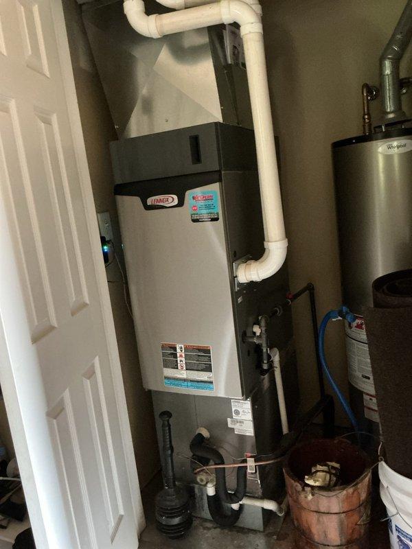 Completed dismissed visit for planned HVAC maintenance on single-system residential installation. Documented Lennox CR33-30/36B-F refrigerant evaporator and furnace system with water heater in mechanical room, verified equipment labeling and specifications, and confirmed all components accessible for future service needs.