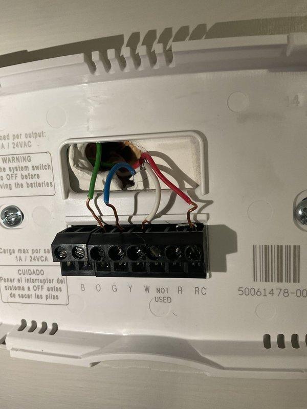 Performed comprehensive HVAC replacement estimate for residential system unable to maintain adequate temperature control. Evaluated existing downflow furnace configuration with coil assembly, documented equipment specifications including dimensional measurements and installation requirements. Assessed current thermostat wiring connections and terminal configurations, photographed system schematic showing uninsulated ductwork components requiring attention during replacement. Reviewed financing options with homeowner for complete system replacement to restore proper heating and cooling capacity.