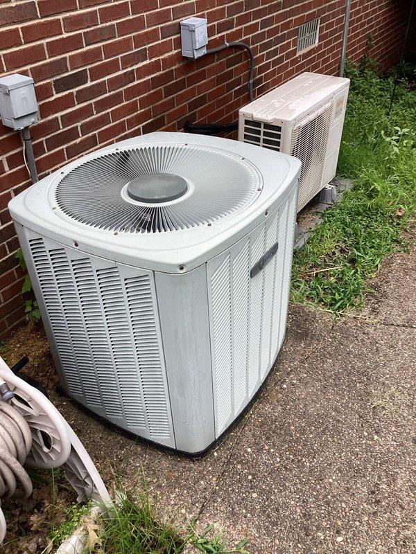 Responded to service call for reduced cooling performance on four-year-old Fujitsu Halcyon mini-split system. Upon arrival, conducted visual inspection of outdoor condenser unit and documented equipment condition with photographs showing unit installed on concrete pad against building exterior with proper clearances maintained. Unit appeared clean with no visible debris obstruction to airflow through ventilation louvers, and refrigerant lines showed proper insulation and secure mounting to structure. Performed standard diagnostic evaluation to assess system operation and identify cause of diminished cooling capacity.