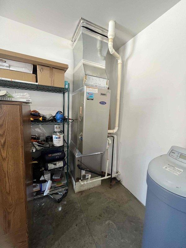 Completed scheduled preventive maintenance on residential split HVAC system consisting of Payne air conditioning condensing unit and Carrier furnace. Performed comprehensive tune-up including inspection of outdoor condenser coils, verification of refrigerant lines, electrical connections, and system controls. Confirmed proper operation of both heating and cooling equipment, documented system conditions with photographic records, and verified all components functioning within manufacturer specifications.