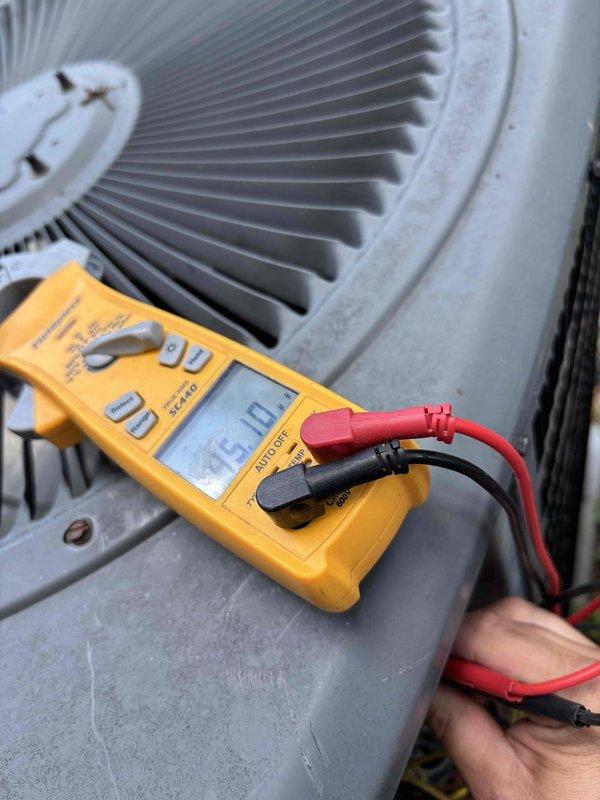 Completed scheduled HVAC tune-up and maintenance inspection on residential system. Performed diagnostic measurements on outdoor condensing unit, including sound level testing at 57dB and electrical parameter verification using digital multimeter. Inspected fan assembly, ductwork insulation, and overall system operation to ensure proper functioning and efficiency.