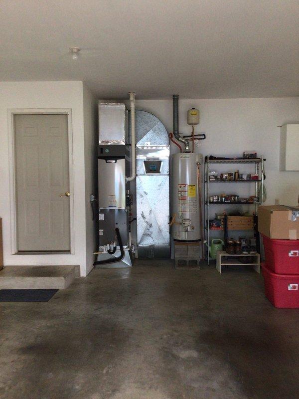 Completed annual HVAC maintenance on 9-month-old system including inspection of furnace/air handler, water heater connections, and dual outdoor condensing units. Replaced 16x25x5 air filter, verified proper operation of all equipment, inspected refrigerant lines and electrical connections at meter, and recommended annual service agreement renewal for continued system protection.