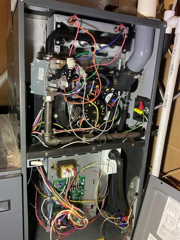 Completed annual planned maintenance visit on residential HVAC system with 16x25x5 filter media approximately 4 years old. Performed comprehensive inspection of indoor furnace unit, accessing internal components including combustion assembly, draft inducer blower, gas valve, control board, and electrical connections. Verified proper operation of all safety controls and electrical systems. Inspected outdoor condensing unit, including electrical panel components, CoreSense diagnostic device, capacitor, contactors, and associated wiring. All equipment found operating within normal parameters with no immediate service concerns identified.