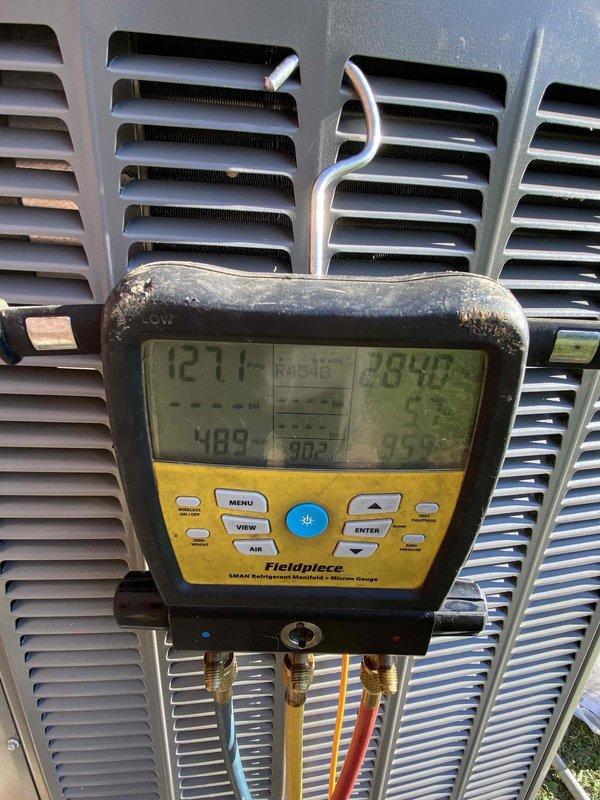 Completed full HVAC system installation including outdoor condensing unit and indoor air handler with associated refrigerant lines and condensate drainage. System was charged with refrigerant, tested for proper operation, and verified temperature differentials and pressures within manufacturer specifications using calibrated digital manifold gauges. All condensate piping was installed with proper pitch and drainage to ensure efficient moisture removal from the system.