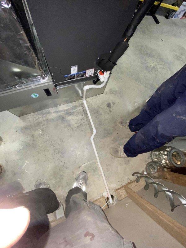 Completed full HVAC system installation including outdoor condensing unit and indoor air handler with associated refrigerant lines and condensate drainage. System was charged with refrigerant, tested for proper operation, and verified temperature differentials and pressures within manufacturer specifications using calibrated digital manifold gauges. All condensate piping was installed with proper pitch and drainage to ensure efficient moisture removal from the system.