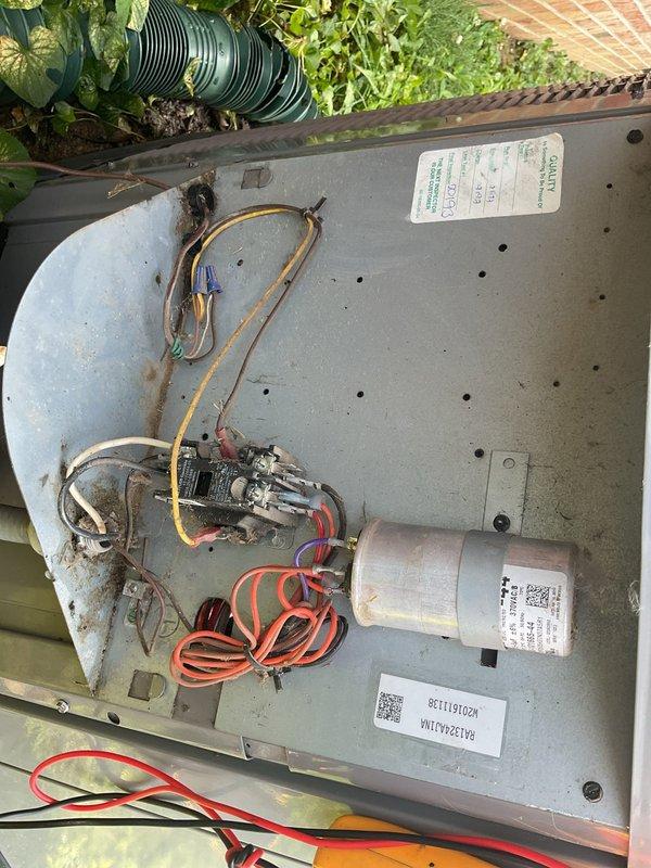 Completed scheduled HVAC maintenance tune-up on residential split system including indoor furnace unit and outdoor condensing unit. Performed comprehensive inspection of furnace components with access panel removed, examining blower motor assembly, electrical connections, circuit boards, and ductwork connections. Inspected outdoor condensing unit with top panel removed, evaluating capacitor condition, contactor operation, electrical wiring integrity, and internal components. All system components found operational with wiring connections intact throughout both units.