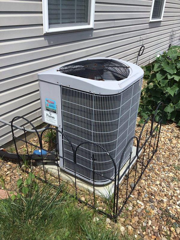 # HVAC Maintenance Report

Completed comprehensive annual preventive maintenance service on an 18-year-old Pakon air conditioning system. Performed complete AC tune-up inspection including exterior condenser unit evaluation and interior air handler system assessment. Unit was found operating within normal parameters at time of service.

Exterior inspection confirmed condenser unit properly positioned on elevated platform with protective enclosure in place. Verified adequate clearance around unit despite nearby vegetation growth. Inspected heat exchanger coil fins for damage and blockage. Examined electrical connections, refrigerant lines, and mounting hardware for signs of wear or deterioration. Condenser fan assembly inspected and verified operational.

Interior air handler inspection accessed through ductwork opening. Evaluated blower assembly, filter housing, and duct connections. Noted dust accumulation on interior surfaces and ductwork panels consistent with normal operation betwe
