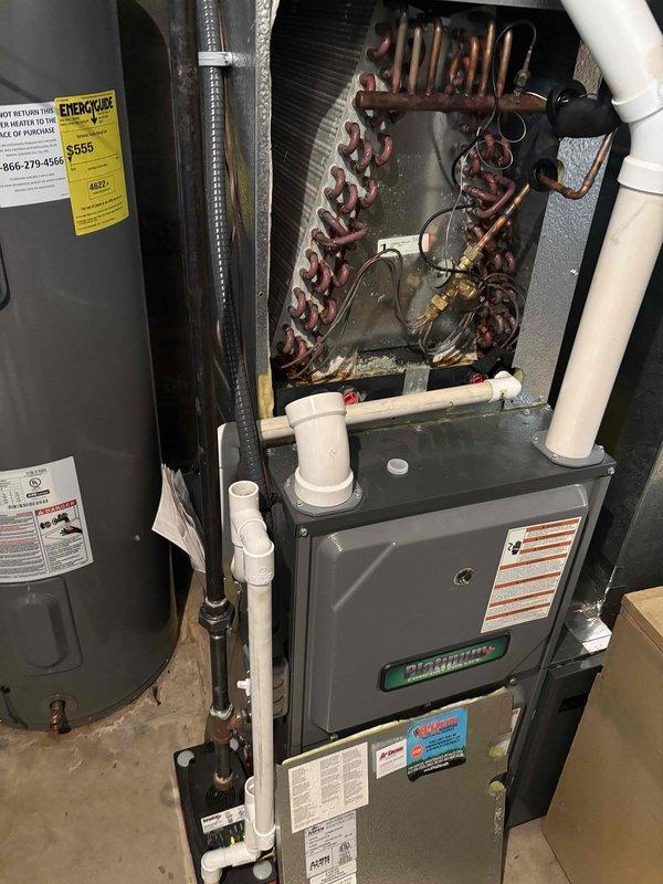 Completed Platinum Level monthly maintenance on a 5-year-old residential HVAC system. Performed comprehensive inspection of furnace, evaporator coil assembly, and all associated components in basement mechanical room. Replaced 16x25x5 air filter per maintenance schedule. Inspected electrical components including capacitor, contactor, and control board—all connections secure and functioning properly. Noted significant oxidation on evaporator coil copper tubing, which is consistent with system age but warrants monitoring for future efficiency concerns. Verified proper operation of condensate drainage system and PVC piping. All safety controls tested and operational. System running within manufacturer specifications with no immediate service needs identified.