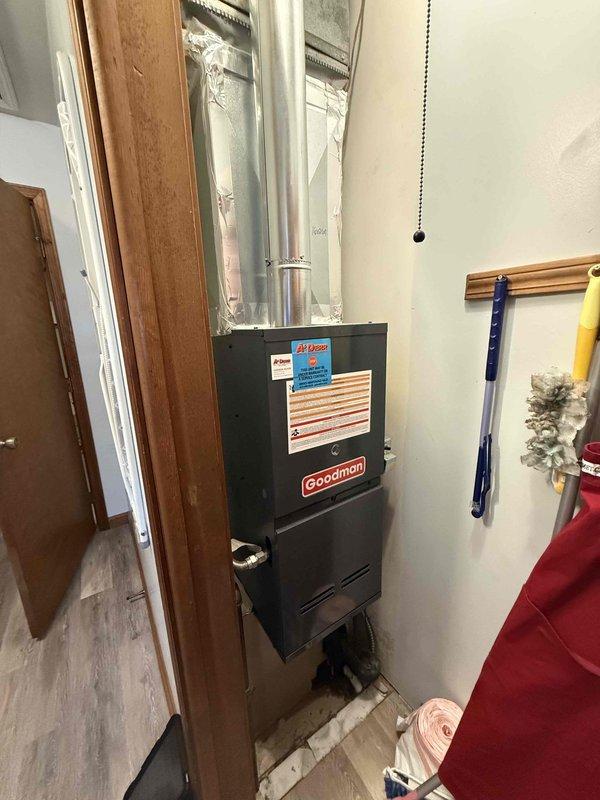 Completed planned duo maintenance on residential HVAC system consisting of exterior Lennox condenser unit and Goodman air handler located in interior utility closet. Performed comprehensive tune-up inspections on both air conditioning components, verifying operational status of equipment, checking refrigerant levels, inspecting electrical connections and conduit, and evaluating ductwork insulation condition. System operational upon completion of maintenance service.