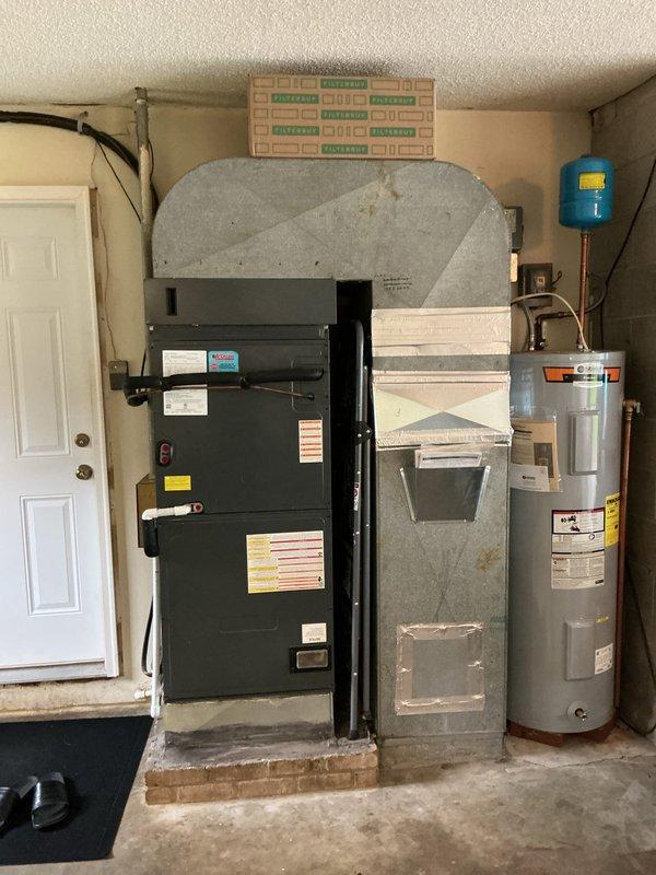 # HVAC Maintenance - Planned Single Maintenance

Completed comprehensive Gold Level preventive maintenance service on 7-year-old residential HVAC system during first annual visit. System consists of indoor air handler unit located in garage utility space and outdoor condensing unit positioned on concrete pad adjacent to building exterior.

## Indoor Unit Service

Performed thorough inspection and maintenance of black air handler unit housed in garage alongside water heater and associated mechanical equipment. Inspected all manufacturer labels and safety warnings for compliance. Evaluated sheet metal ductwork connections and verified proper sealing throughout air distribution system. Checked unit mounting and structural support for stability. Verified proper clearances around equipment for service access and safe operation. Inspected electrical connections and control wiring at unit. Changed 25x20x5 media air filter to ensure optimal airflow and system efficiency. Examined condensate dr