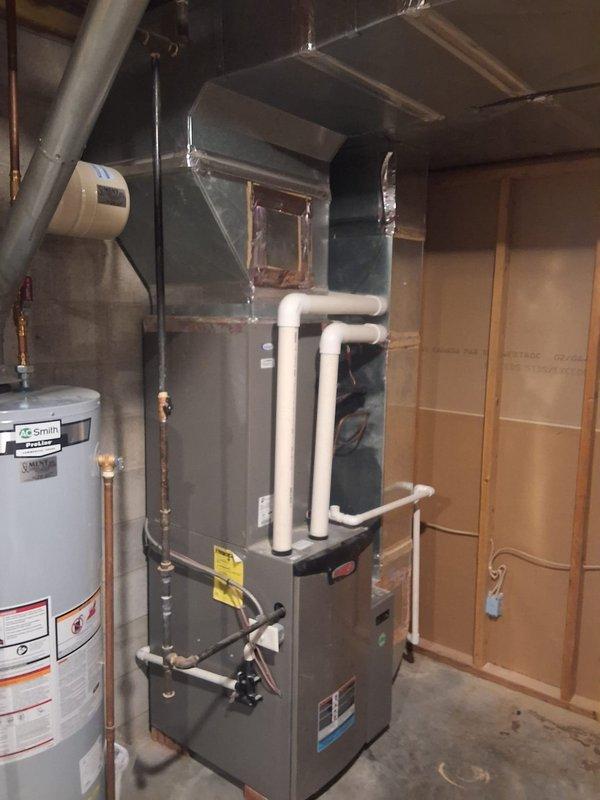 Responded to service call for thermostat connectivity issues following homeowner's attempted replacement of Lennox iComfort thermostat with aftermarket unit. Upon arrival, found original Lennox iComfort thermostat reinstalled but displaying only startup screen and unable to establish communication with HVAC system. Diagnosed communication failure between thermostat and furnace control board, likely caused by improper wiring sequence during replacement attempt. Verified system airflow present and cooling operation functional at equipment level. Reconnected and reconfigured iComfort thermostat wiring to manufacturer specifications, restored proper communication protocol between thermostat and system controls, and successfully re-established full thermostat functionality with temperature display and system status information.