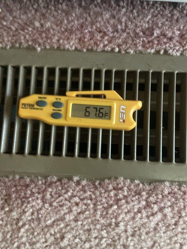 Responded to service call for evaporator coil replacement on system located in closet. Confirmed appointment availability and coordinated access through neighbor. Performed system diagnostics and temperature readings, measuring 82.7°F at return air and 67.6°F at supply register, confirming approximately 15-degree temperature split. Documented existing evaporator coil with photographs including model and serial number information to expedite part ordering. System currently operational with green priority status. Part has been ordered and is ready for installation. Customer account shows zero balance due with payment received in full.