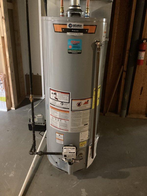 Completed installation of State ProLine water heater in basement utility area, including all required water supply connections with copper piping and brass fittings. Installed gas line with appropriate shutoff valve and safety controls. Mounted and connected water softener system to incoming water supply line to provide whole-house water treatment. Installed customer-supplied kitchen sink with proper drainage connections and supply lines. All installations performed to code specifications with secure mounting, proper venting, and leak-free connections. Verified system operation and water flow throughout all installed fixtures and appliances.